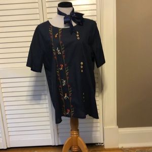 Navy embroidered detail, short sleeved blouse. Short sleeved.